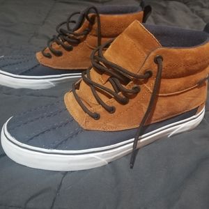 Van's High top blue rubber/brown suede shoes.